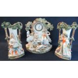 German porcelain clock garniture set decorated with horses and figures in a hunting scene. (3) (B.P.
