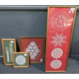 Four framed and glazed textile samples of crochet and lace. (B.P. 21% + VAT)