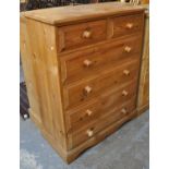 Modern pine straight front chest of two short and four long drawers with turned handles on bracket