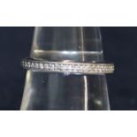 18ct white gold diamond full eternity ring. Estimated diamond weight 0.25cts. Ring size N. Weight