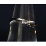 9ct white gold two stone diamond ring. Ring size N. Weight approx 2 grams. (B.P. 21% + VAT)