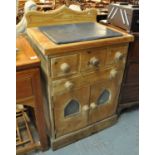 Pine butcher's block of square form having an arrangement of four drawers with two blind panelled