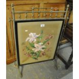 Late 19th/early 20th Century aesthetic design brass framed firescreen, the panel hand painted with