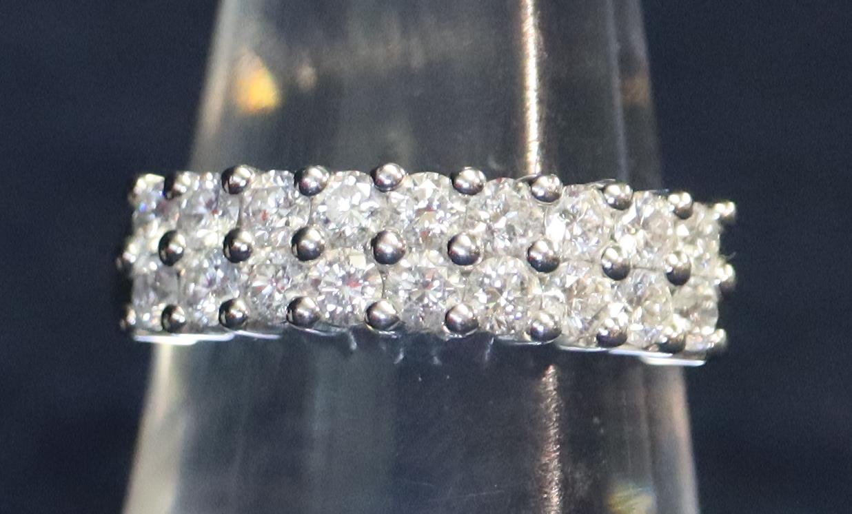 18ct gold two row diamond ring of 18 brilliant cut diamonds. Estimated total diamond weight 1ct.