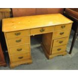 Early 20th Century pine knee hole desk, having three drawers to each pedestal. (B.P. 21% + VAT)