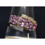 9ct gold diamond and pink gem set dress ring. 2.8g approx, ring size S. (B.P. 21% + VAT)