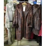 Three vintage fur coats to include; Victor Seagal, Howells of Cardiff and a belted coney coat. (