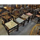 Set of three 19th Century oak camel back farmhouse chairs, together with a similar camel back carver