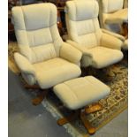 A pair of modern cream upholstered reclining swivel armchairs with matching stool. (3) (B.P. 21% +