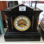 Late 19th/early 20th century black slate and marble architectural design two-train mantel clock. (