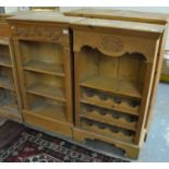 Modern pine wine rack, together with a modern pine three section open bookcase, both carved with