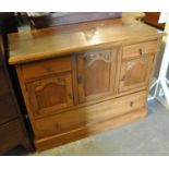 Edwardian satinwood and pine carved sideboard with an arrangement of doors on a projecting