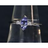 18ct white gold tanzanite and diamond ring. Ring size N&1/2. Weight approx 2.3 grams. (B.P. 21% +