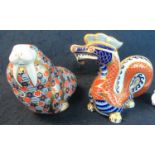 Royal Crown Derby bone china paperweight in the form of a dragon, no stopper to base. Together