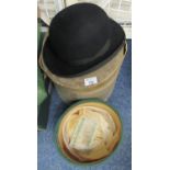 Two cardboard hat boxes, containing a black felt bowler hat marked to the inner brim 'Moores British