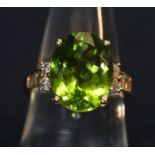 18ct gold green stone and diamond ring. Ring size O. Weight approx 7.4 grams (B.P. 21% + VAT)