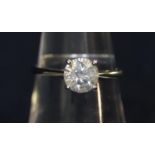 18ct white gold diamond solitaire ring. The brilliant cut stone an estimated 1ct. Ring size M Weight