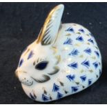 Royal Crown Derby bone china paperweight in the form of a rabbit, gold stopper to base. (B.P.