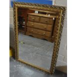 Modern gilt foliate framed bevel plate mirror. 106 x 75cm approx. (B.P. 21% + VAT)