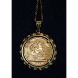 Full gold sovereign dated 1958 in 9ct gold mount with chain. (B.P. 21% + VAT)