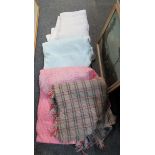 Box of vintage textiles to include; three vintage cotton quilts in various colours, one by Laura