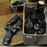 Box containing assorted camera lenses to include; Tamron, Yashica, Chinon etc. (B.P. 21% + VAT)