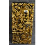 Chinese gilded carved and pierced relief panel overall with figures of fighting warriors amongst