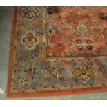 Large collection creation floral and foliate carpet on a salmon and blue ground, made in Belgium,