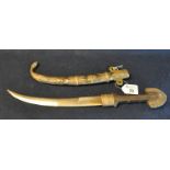 Middle Eastern design dagger with brass and copper scabbard and turned wooden and metal handle. (B.