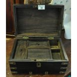 Hardwood box of rectangular form with brass mounts and loop handles, the interior revealing lidded