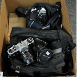Box of camera equipment to include: two Pentax cameras, a Pentax Abahi and a Pentax Honeywell,