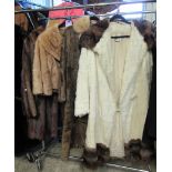 Three vintage fur coats to include; a cream coat with brown collar and trim with Harrods of