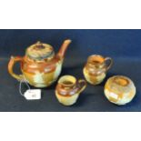 Collection of Doulton Lambeth stoneware items to include; baluster teapot with silver rim, two