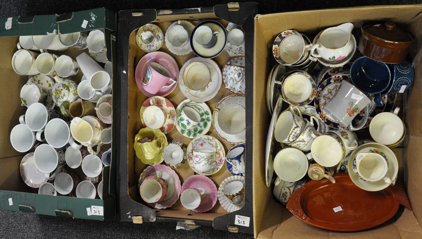 Three boxes of assorted china, largely teacups and saucers but also jugs, mugs etc., to include: