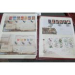 Great Britain collection of First Day Covers in maroon album. 2002 to 2013. Commemoratives and