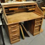 Early 20th Century oak S shaped roll top pedestal desk. 120cm wide approx. (B.P. 21% + VAT)