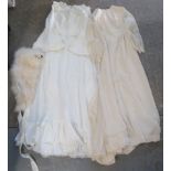 Two high necked 1970's wedding dresses, one with crochet detail, one with lace, together with an