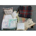 Two boxes of various textiles to include; two vintage check woollen blankets in different colours,