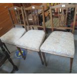 Set of three inlaid rosewood parlour chairs with pierced backs and stuff over seats on square