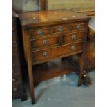 Reproduction mahogany cutlery cabinet or canteen with two opening flaps to the top above an