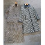 A black and white houndstooth wool vintage coat with Betty Barclay and a woolmark label with faux