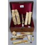 19th century leather jewellery or work box, the interior revealing assorted bone and ivory items
