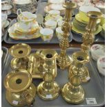 Tray of brassware to include; brass candlesticks and chamber sticks etc. (B.P. 21% + VAT)