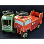 Two modern painted wooden toys of a tractor and fire engine by Kiddimoto Transport. (2) (B.P.