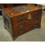 A Chinese carved hardwood cutlery box having fitted interior with two drawers. 57cm wide approx. (