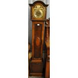 Early 20th Century oak three train Grandmother clock with brass face, having silvered Roman dial. (