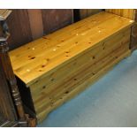 Modern natural pine blanket chest with hinged lid. 140cm wide approx. Together with a modern natural