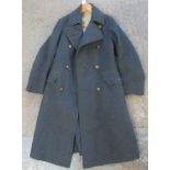 Blue woollen RAF greatcoat with brass buttons embossed with a crown and a bird and a 'Greatcoats