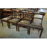 Set of four 19th Century mahogany Trafalgar backed dining chairs with drop in seats on baluster
