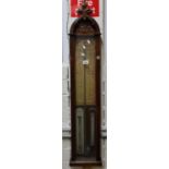 Early 20th Century walnut Admiral Fitzroy's barometer with coloured backing paper, the arch top